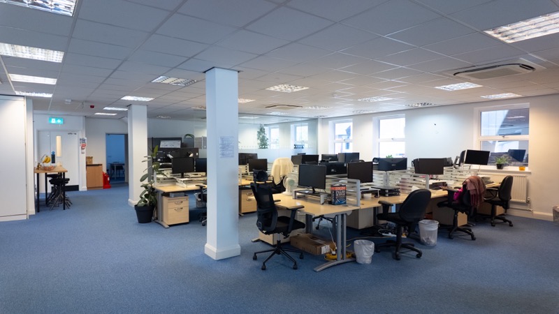 Open plan office with desking, suspended ceilings and LED lighting